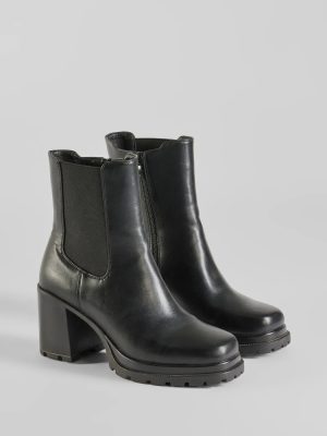 Edgy Strut Faux Leather Platform Booties