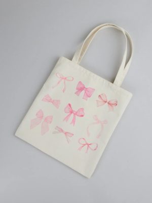About A Girl Bow Canvas Tote Bag